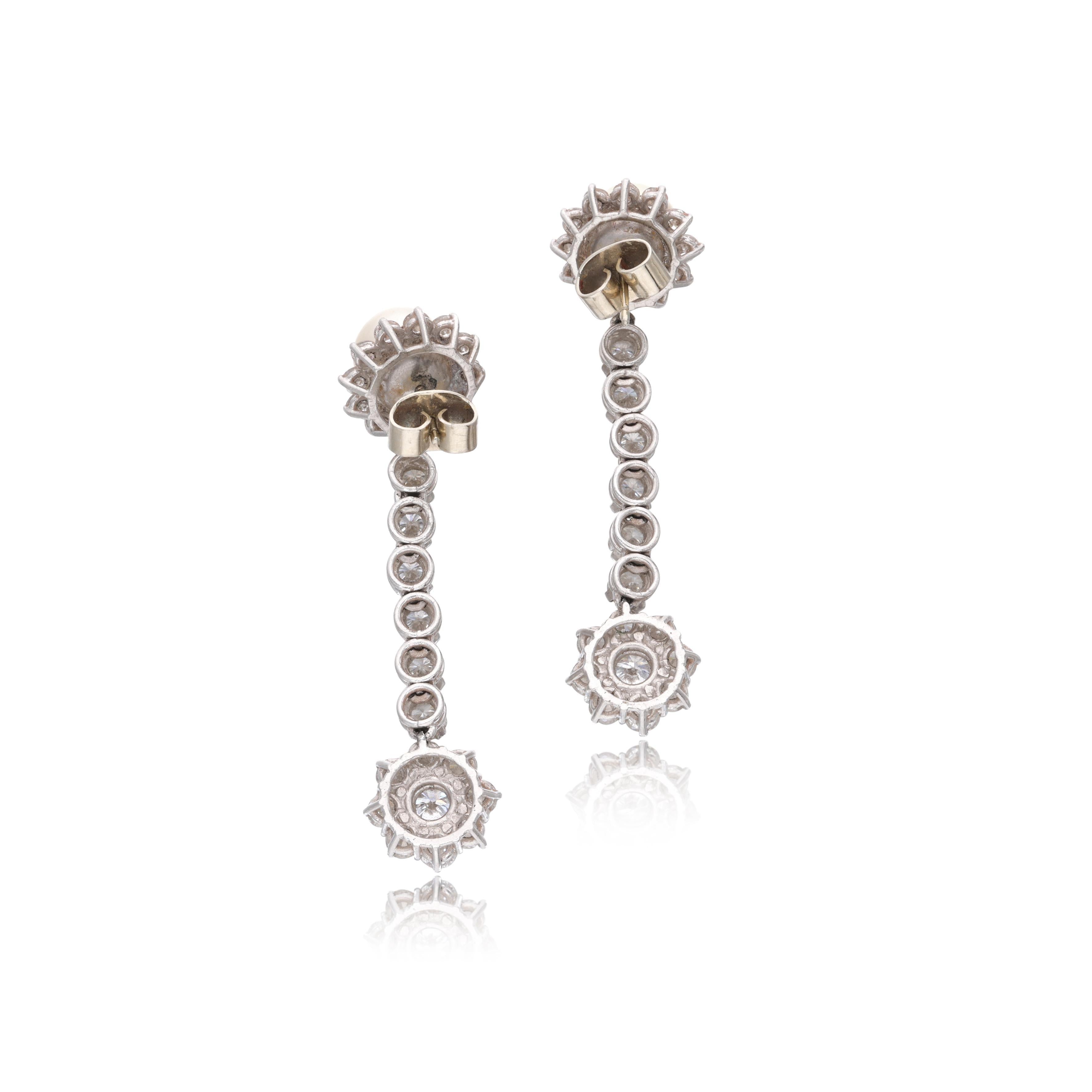 7.00 Carat Round Brilliant G VS1 Diamond 14 Karat White Gold Dangling Earring