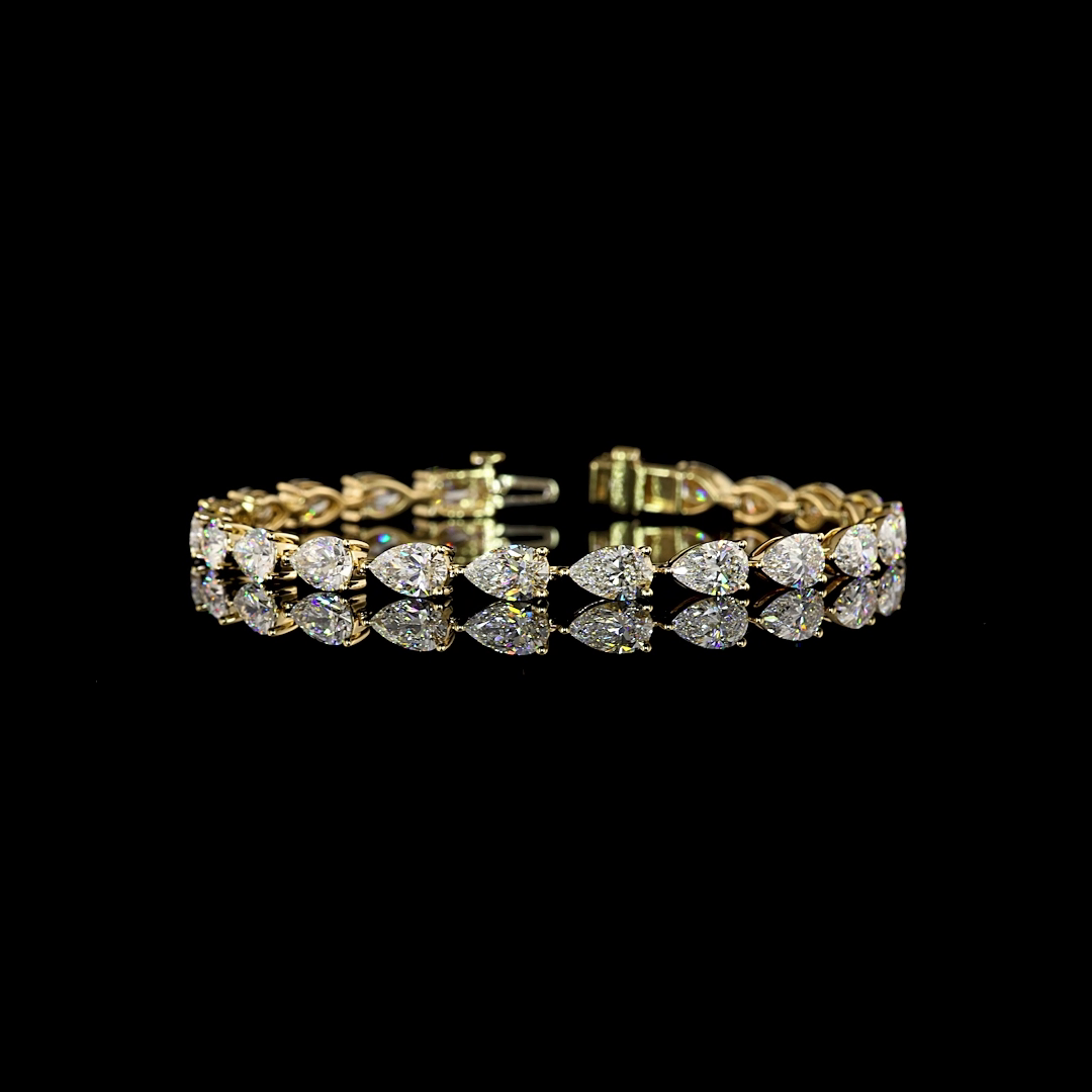Lab-Grown 12.04 Carat Pear E-VS Diamond 14K Yellow Gold Tennis Bracelet