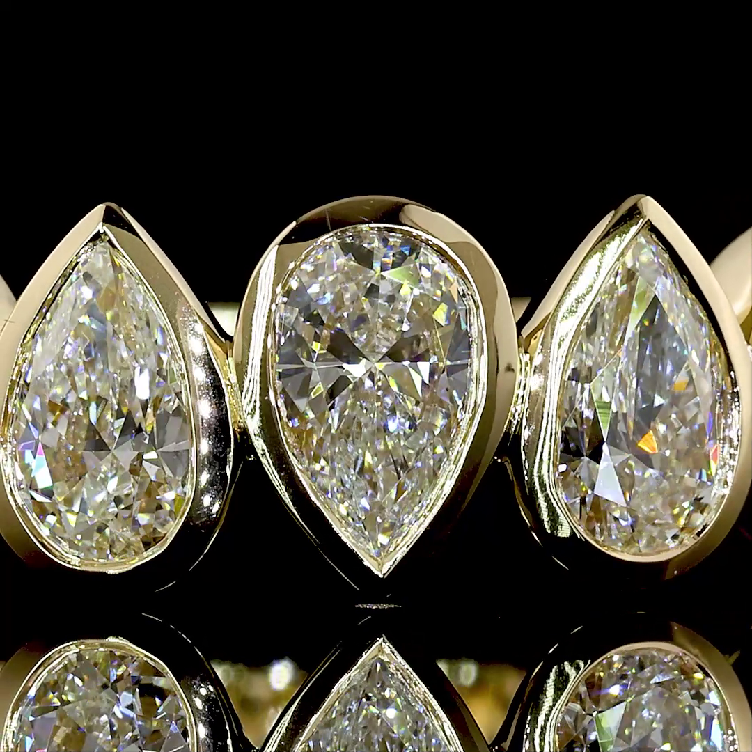 Lab-Grown 2.43 Carat Pear E-F-VS Diamond 14K Yellow Gold 3/4 Band Eternity Ring