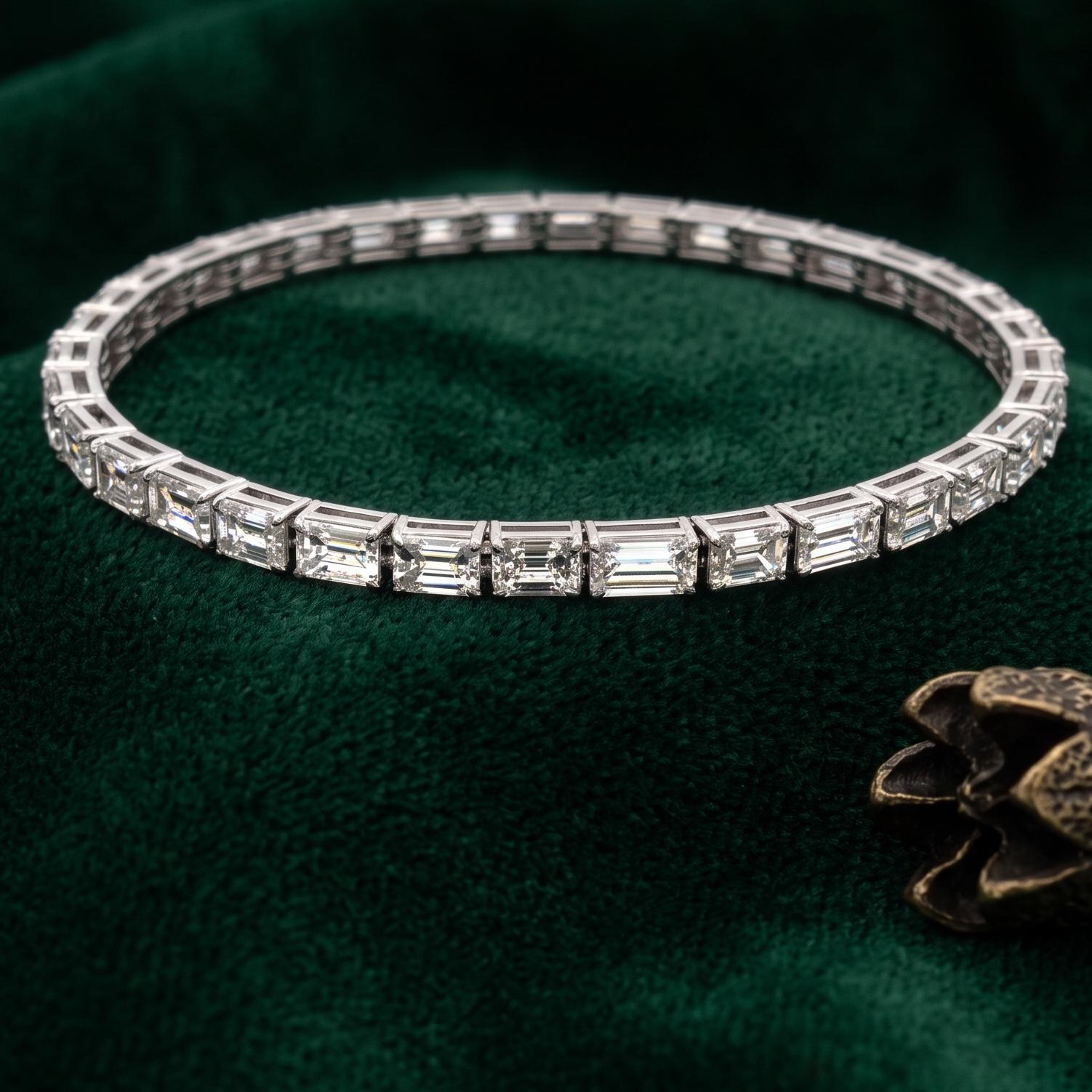 18K White Gold Tennis Bracelet with 11.96 Carat Emerald Cut H VS Diamonds