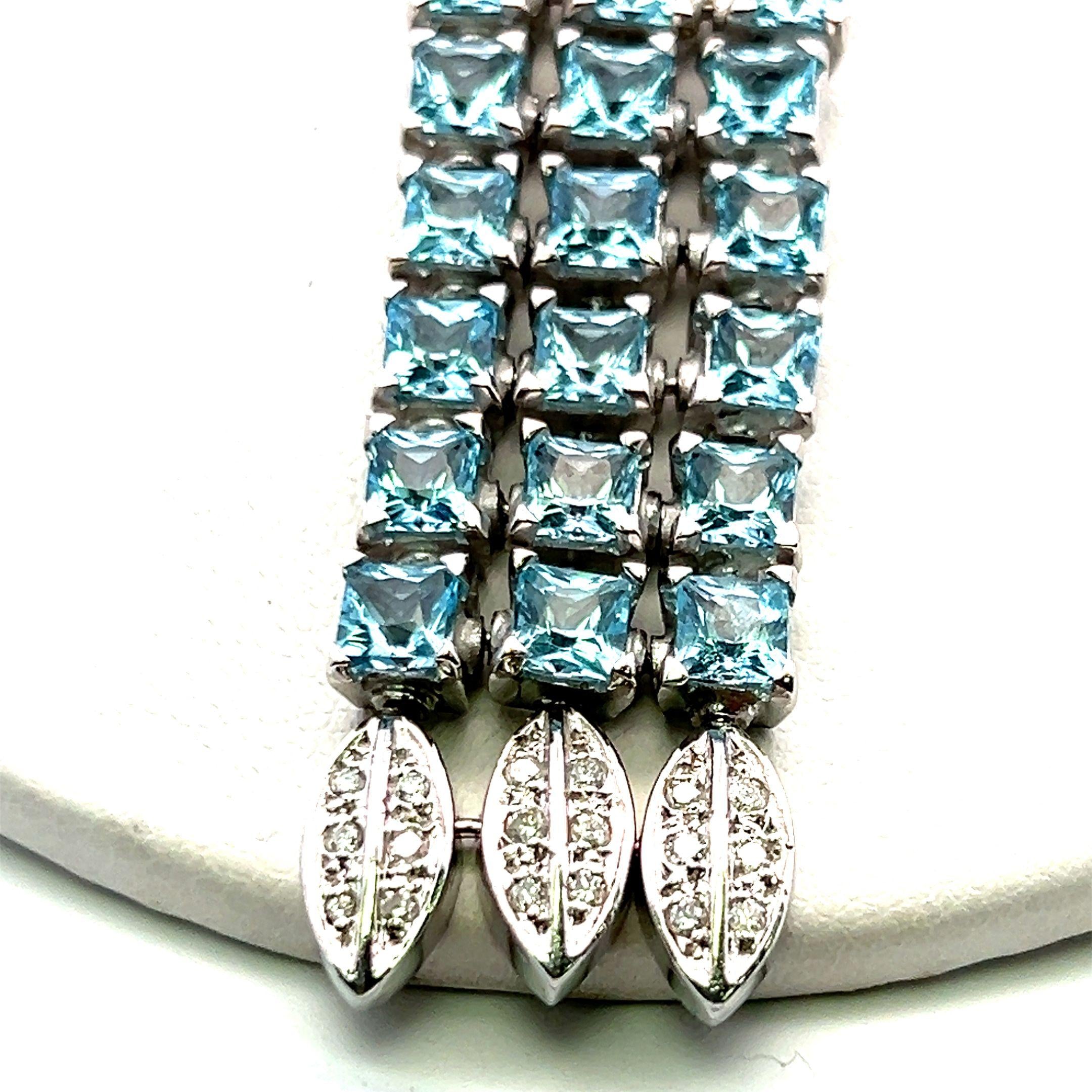 18K WG Pendant Necklace with 1.56 Carat Round Diamonds and 8.23 Carat Blue Topaz