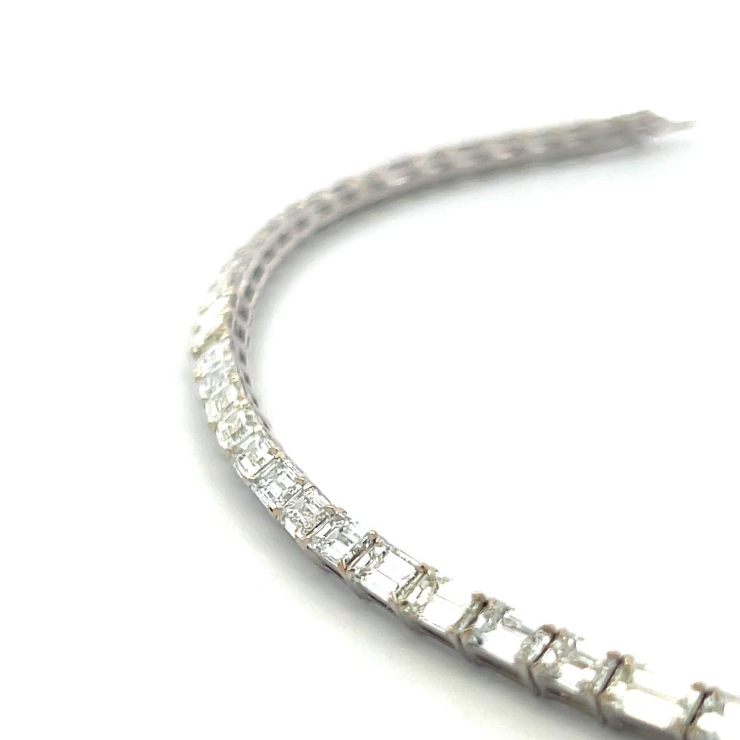 18K White Gold Tennis Bracelet with 11.96 Carat Emerald Cut H VS Diamonds
