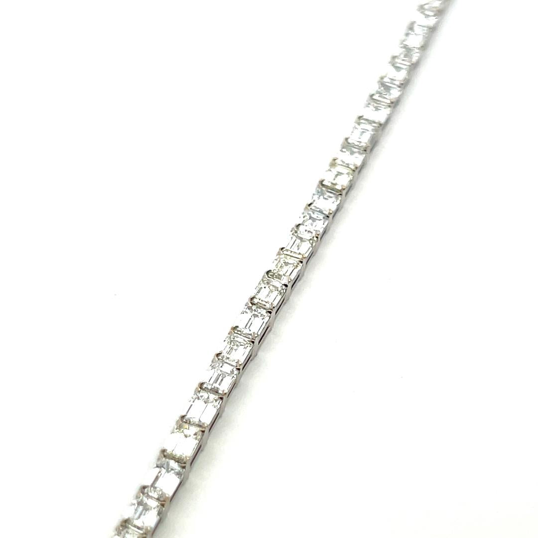 18K White Gold Tennis Bracelet with 11.96 Carat Emerald Cut H VS Diamonds
