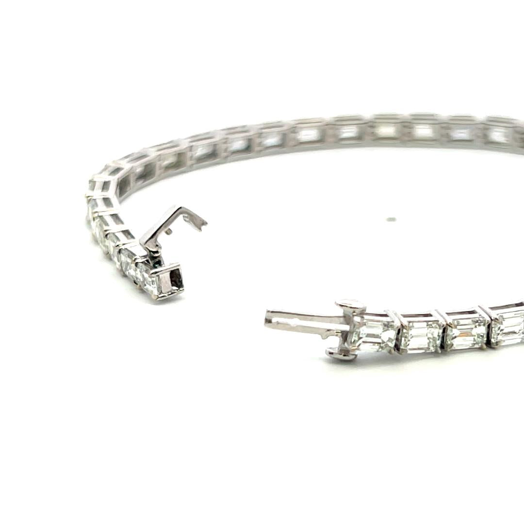 18K White Gold Tennis Bracelet with 11.96 Carat Emerald Cut H VS Diamonds