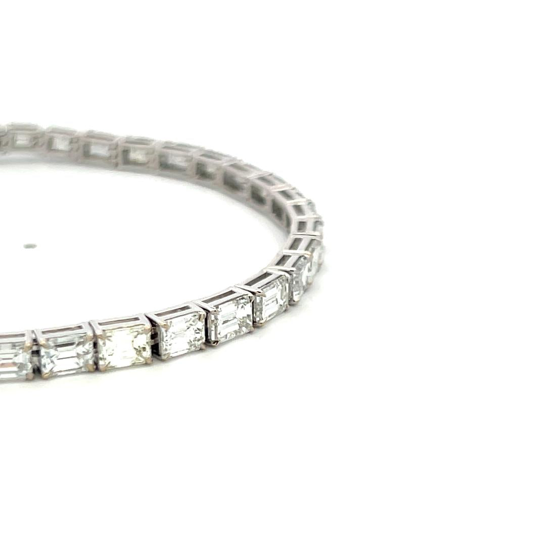 18K White Gold Tennis Bracelet with 11.96 Carat Emerald Cut H VS Diamonds