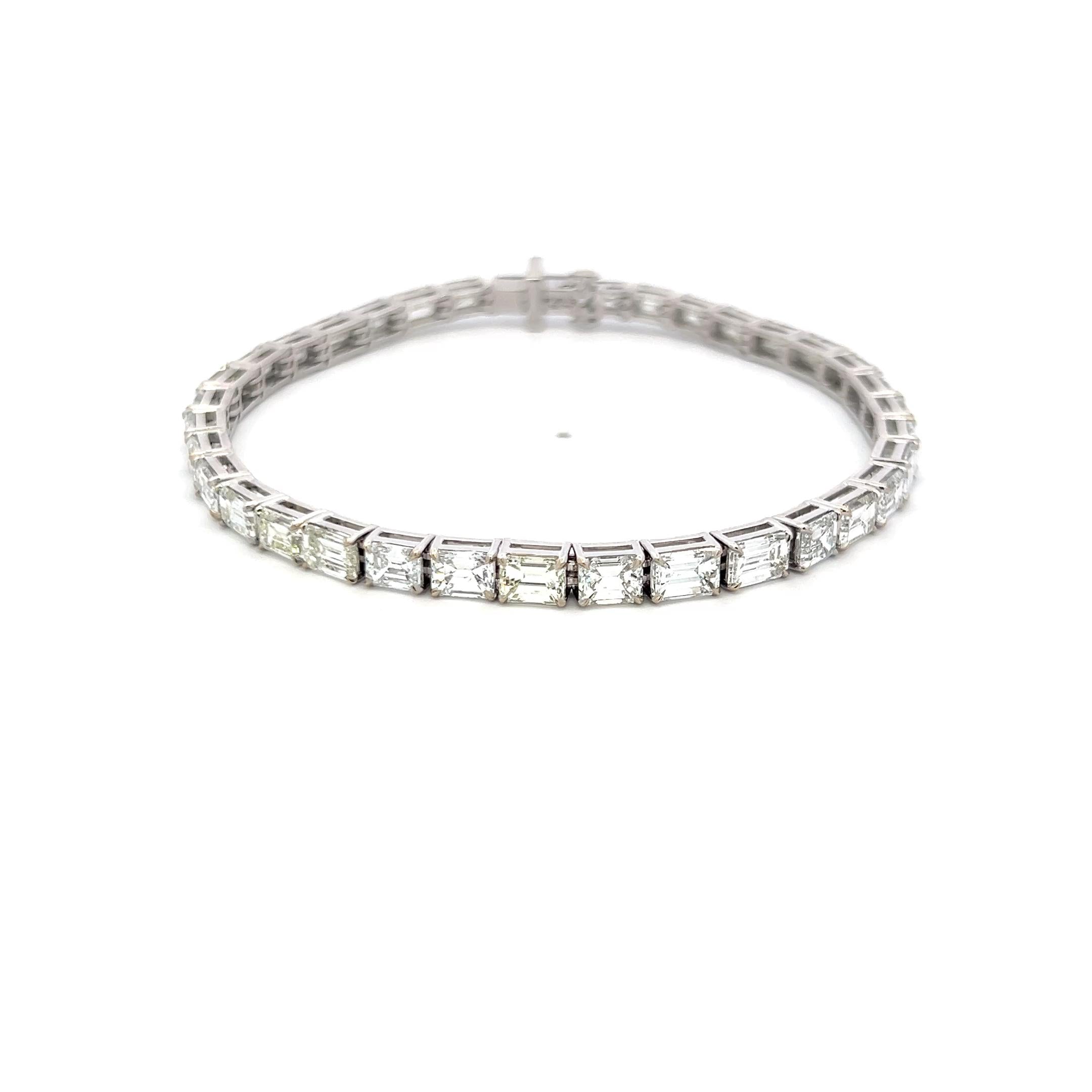 18K White Gold Tennis Bracelet with 11.96 Carat Emerald Cut H VS Diamonds