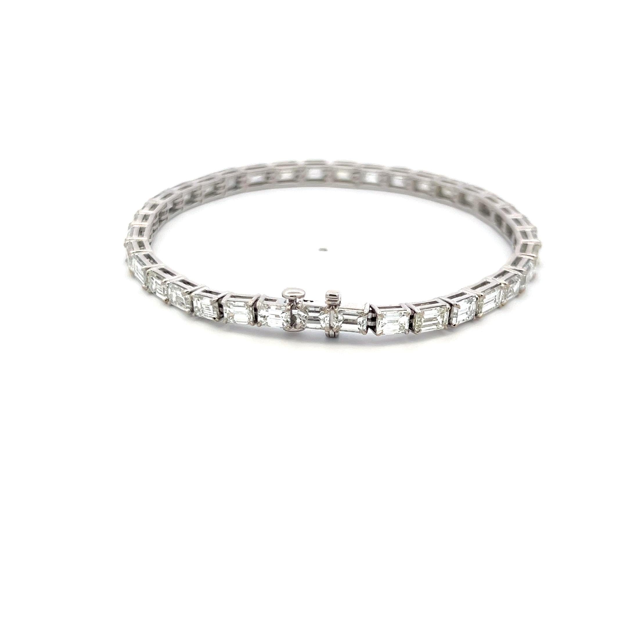 18K White Gold Tennis Bracelet with 11.96 Carat Emerald Cut H VS Diamonds