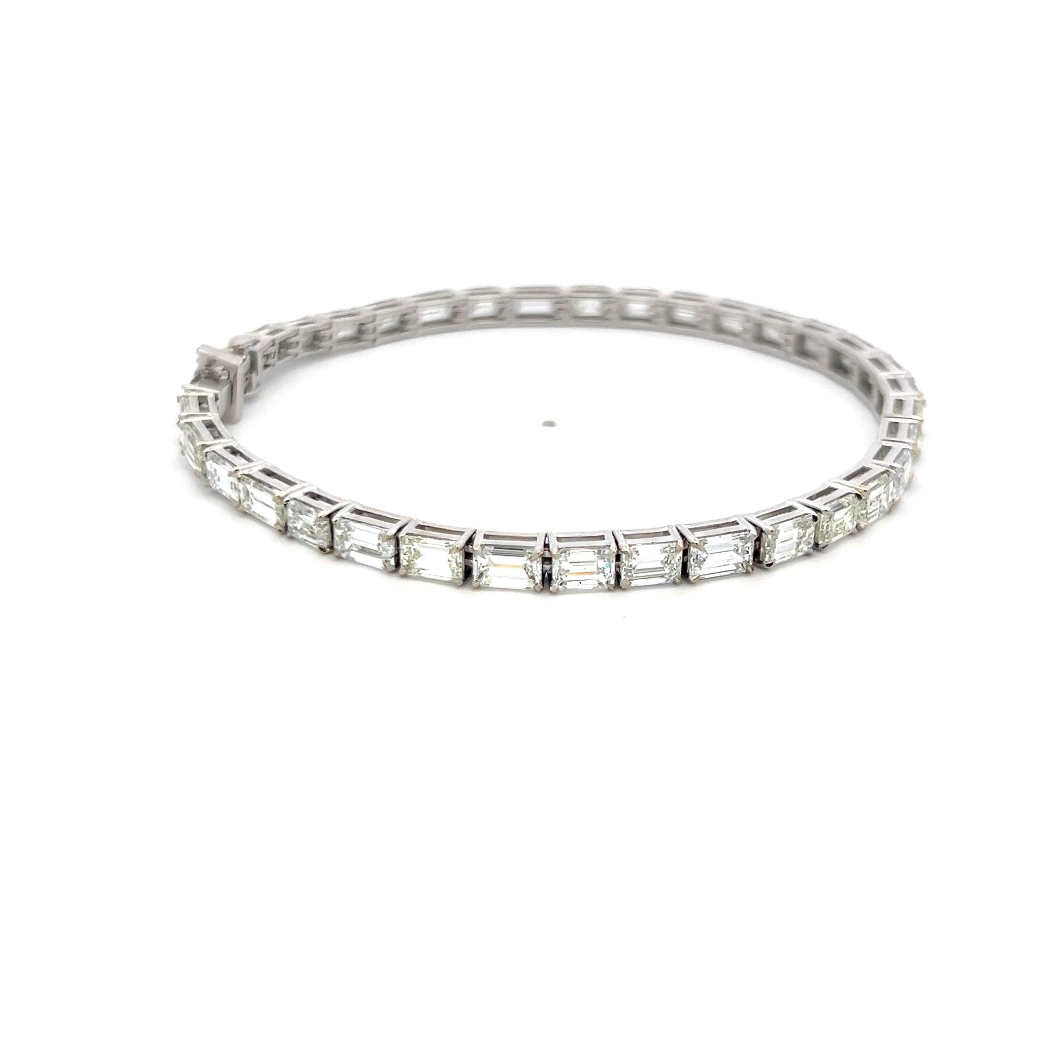 18K White Gold Tennis Bracelet with 11.96 Carat Emerald Cut H VS Diamonds