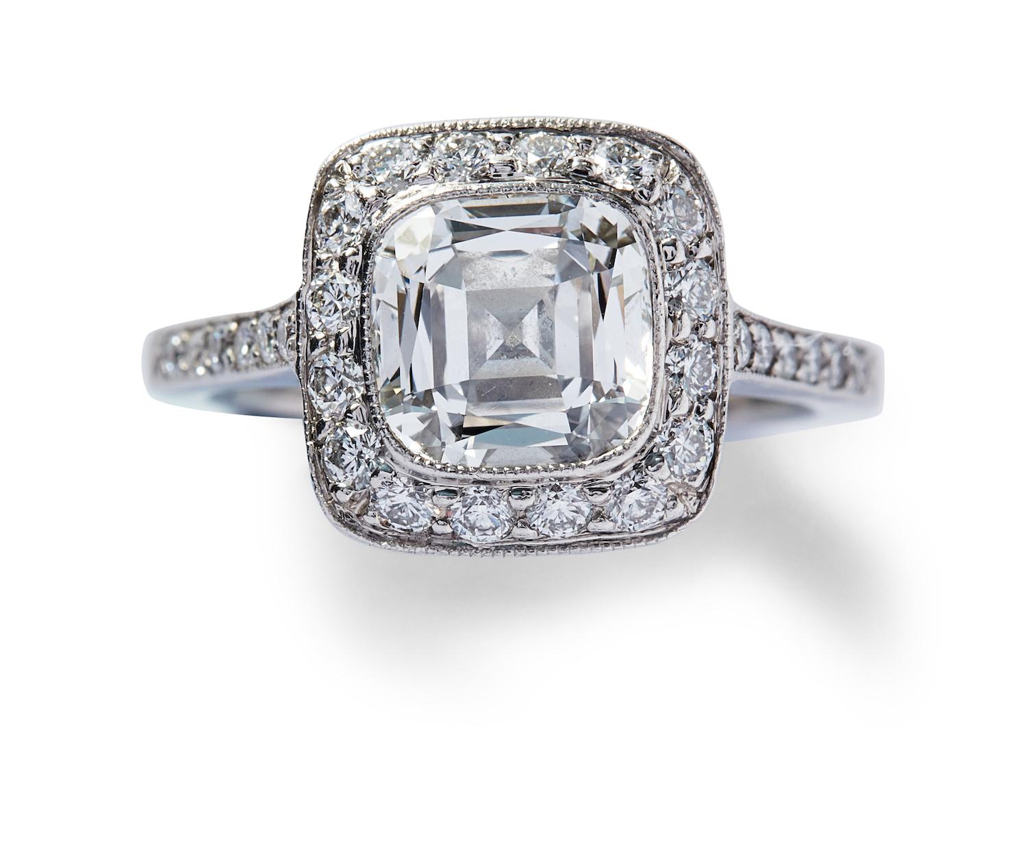 Tiffany & Co Platinum Halo Ring with 2.65 Carat Cushion & Round Diamonds Size 4