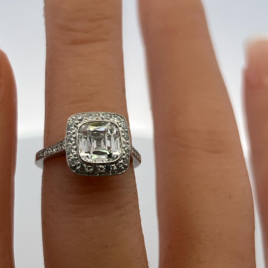 Tiffany & Co Platinum Halo Ring with 2.65 Carat Cushion & Round Diamonds Size 4