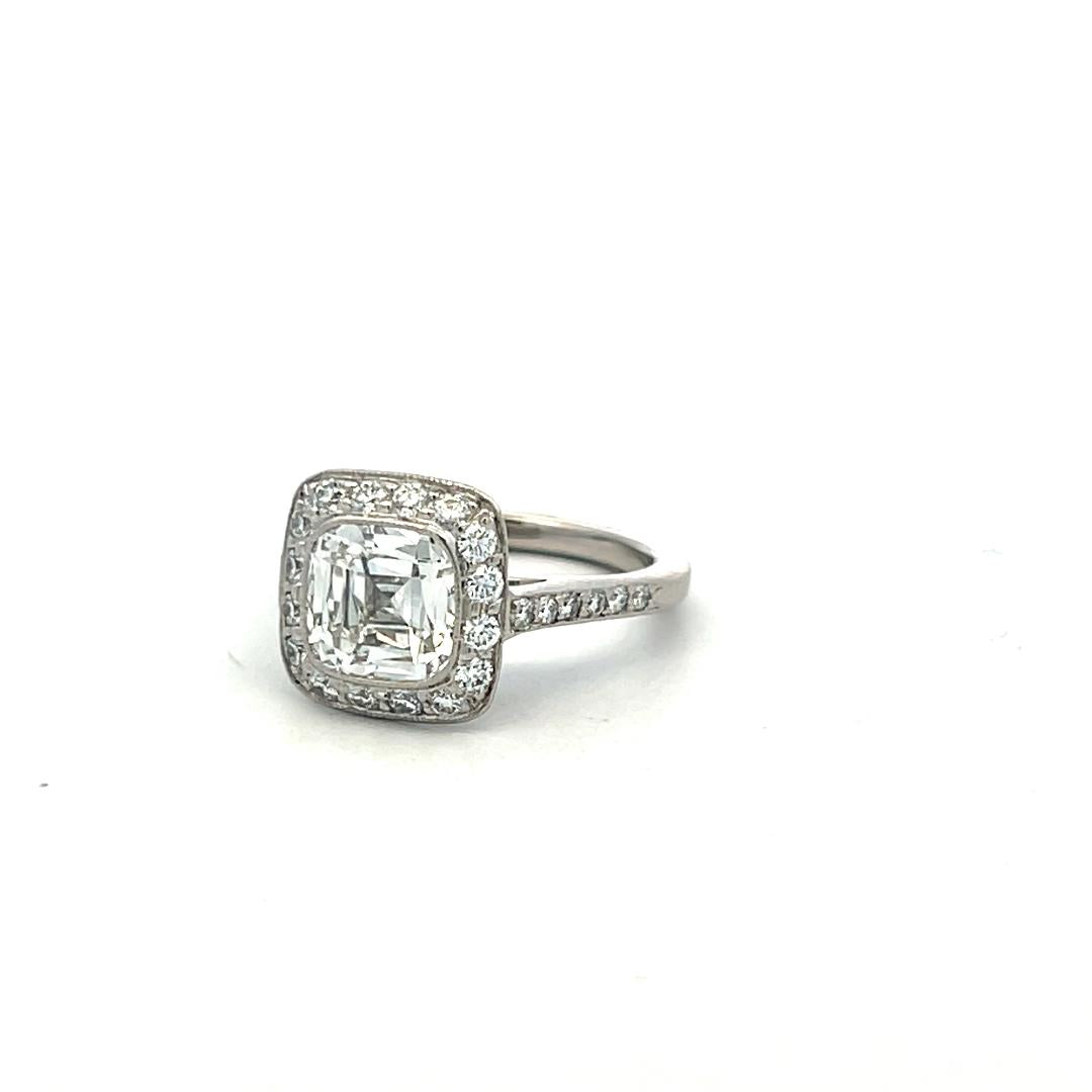 Tiffany & Co Platinum Halo Ring with 2.65 Carat Cushion & Round Diamonds Size 4