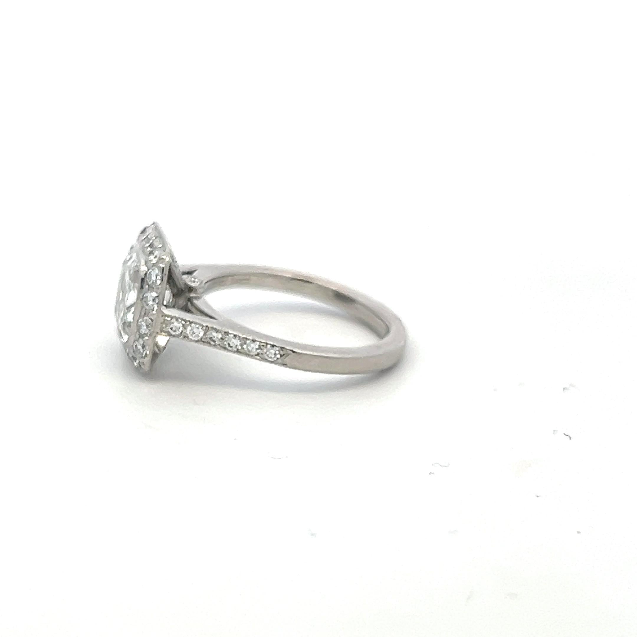 Tiffany & Co Platinum Halo Ring with 2.65 Carat Cushion & Round Diamonds Size 4