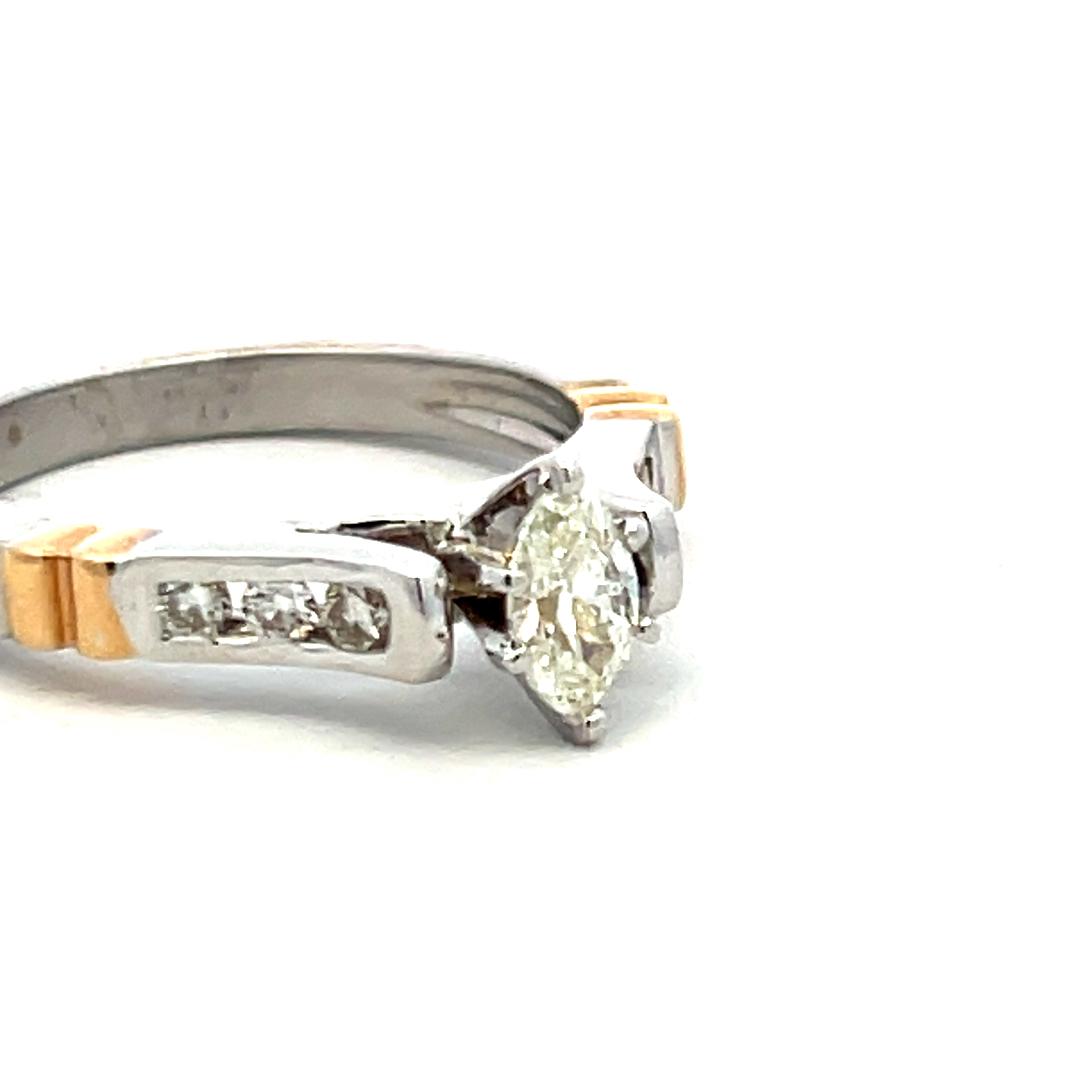 0.90 Carat Marquis Shape and Round Brilliant I VS Diamond 14 Karat Yellow Gold E