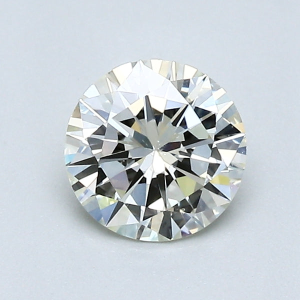 0.73 Carat Round Brilliant Diamond color M Clarity SI1, natural diamonds, precious stones, engagement diamonds