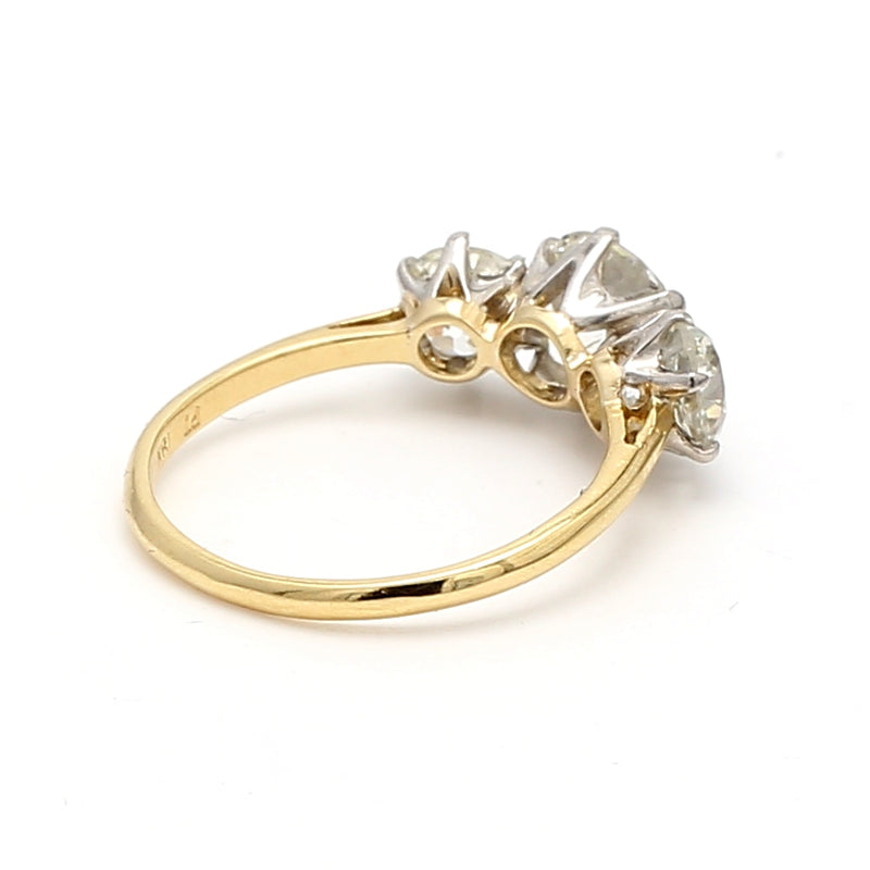 3.20 Carat Old European Cut K-SI1 Diamond 18 Karat Yellow Gold Three-Stone Ring