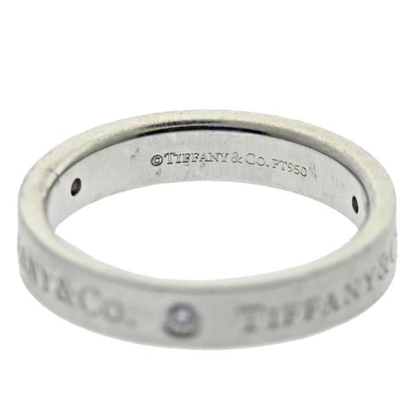 Tiffany and Co 0.12 Carat Round Brilliant Diamond Platinum Band Ring