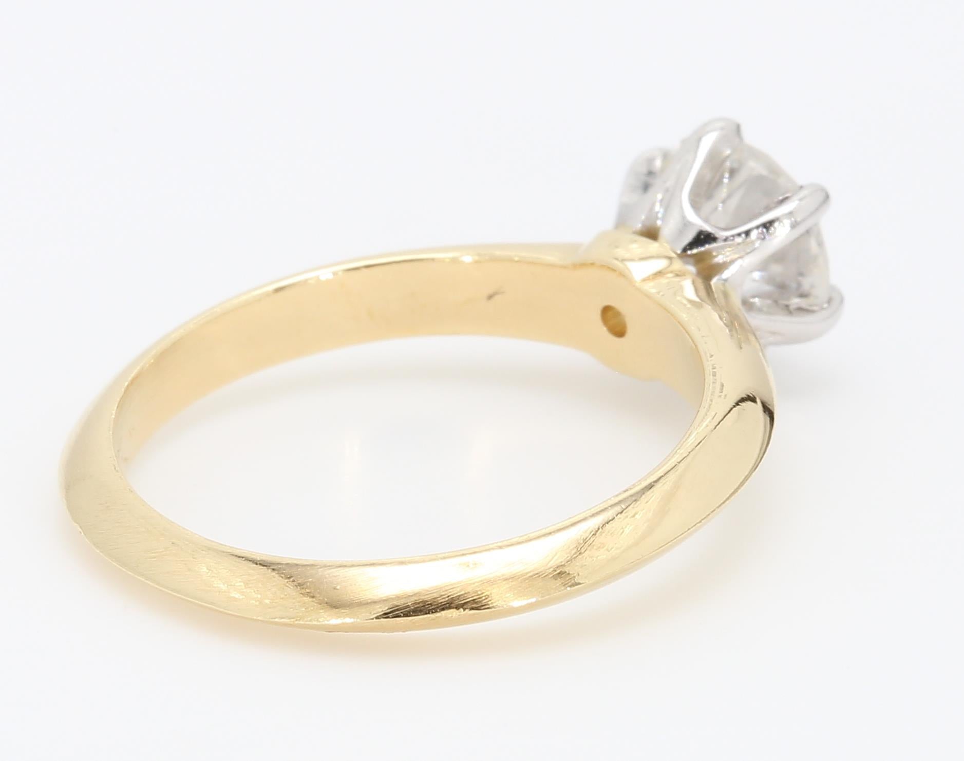 Tiffany and Co 1.07 Carat Circular Brilliant Shape F-SI1 Diamond 18 Karat Yellow Gold Engagement Ring